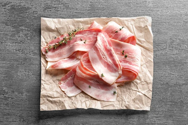 Rashers of bacon on table — Stock Photo, Image