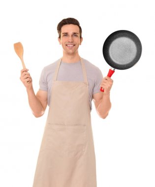 kızartma tavası ve spatula ile adam