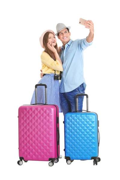 Gelukkig toeristen met koffers — Stockfoto