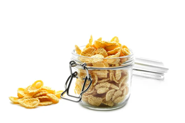 Glas mit Cornflakes auf weißem Hintergrund — Stockfoto