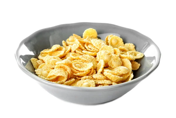 Schüssel mit leckeren Cornflakes auf weißem Hintergrund — Stockfoto