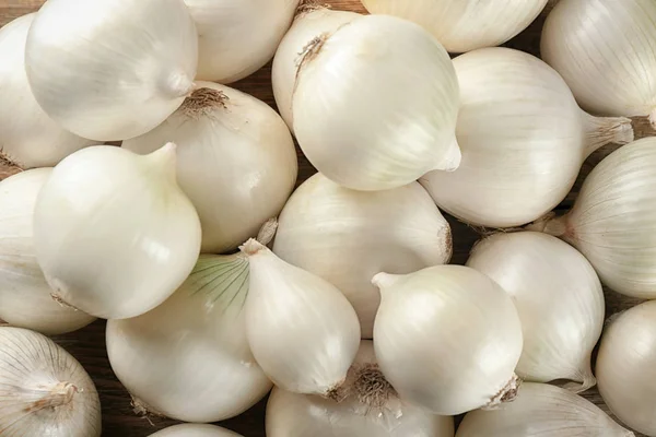 Reife Zwiebeln als Hintergrund — Stockfoto