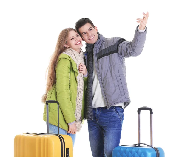 Happy tourists with suitcases — Stock Photo, Image
