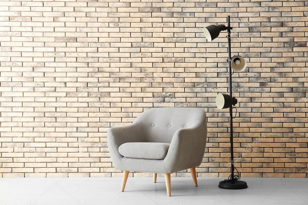 Stylish armchair and lamp