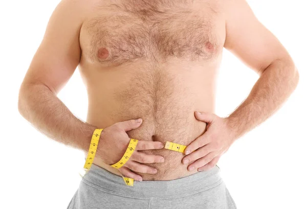 Overweight man with measuring tape — Stock Photo, Image