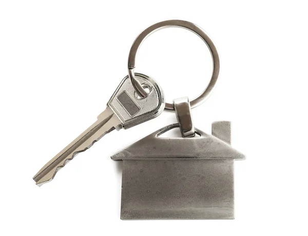 Key with trinket in shape of house — Stock Photo, Image