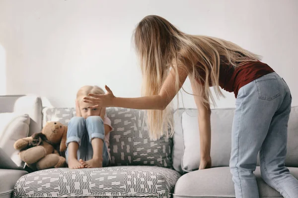 Young woman abusing her daughter — Stock Photo, Image