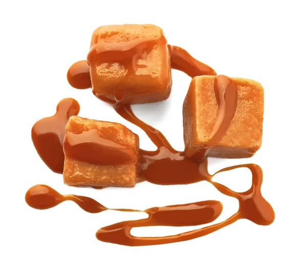 Delicious candies with caramel sauce — Stock Photo, Image