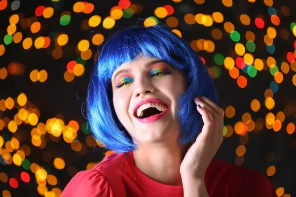 Mujer joven con maquillaje de ojos de arco iris —  Fotos de Stock