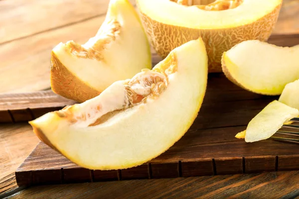 Ripe yummy melon on wooden board — Stock Photo, Image