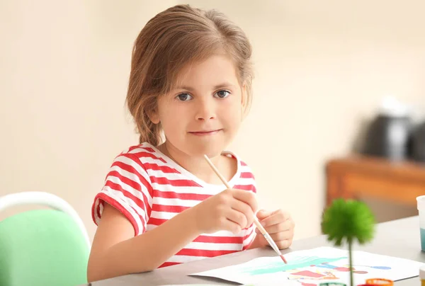 Little girl painting Stock Picture