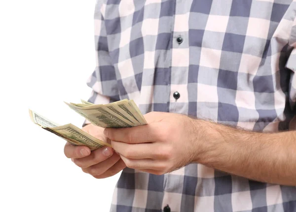 Jovem com notas de dólar no fundo branco, close-up — Fotografia de Stock