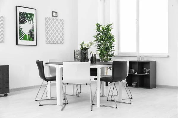 Modern room interior with big table and chairs — Stock Photo, Image