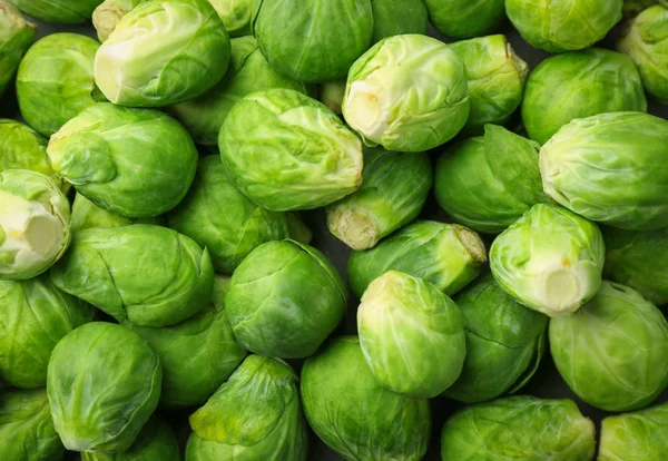 Raw Brussels sprouts as background — Stock Photo, Image