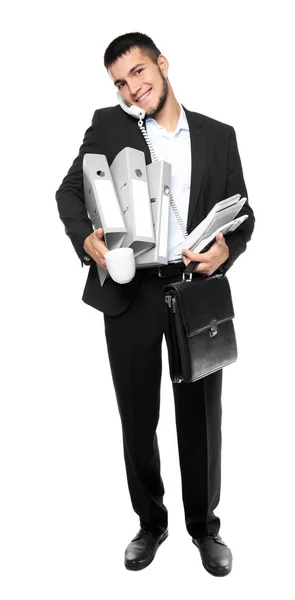 Gestor masculino com material de escritório diferente no fundo branco — Fotografia de Stock