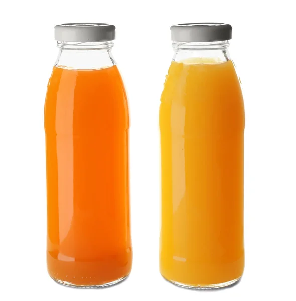 Bottles with juices on white background — Stock Photo, Image