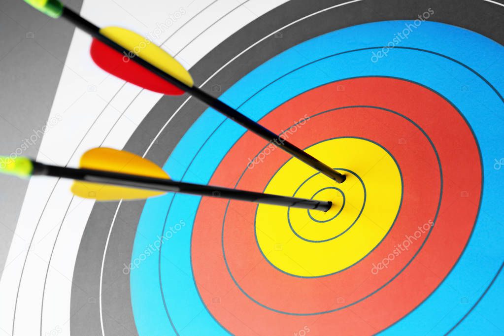 Arrows in the center of target for archery, closeup