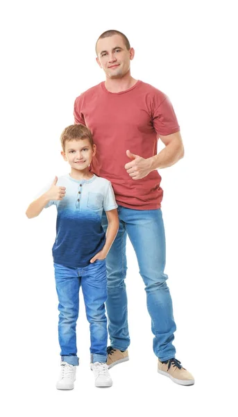 Papá y su hijo mostrando pulgares hacia arriba gesto sobre fondo blanco — Foto de Stock