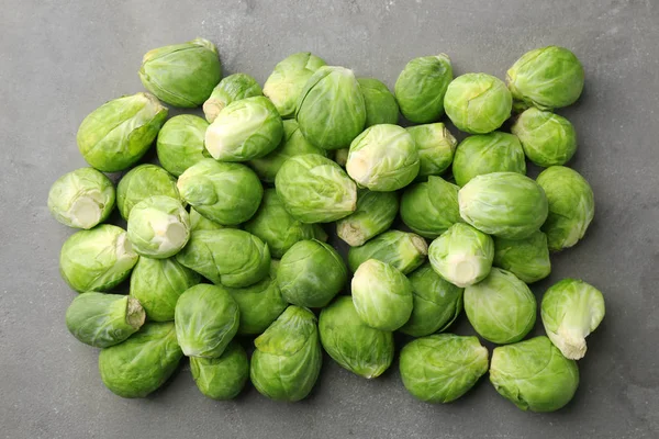 Fresh raw Brussels sprouts on table — Stock Photo, Image