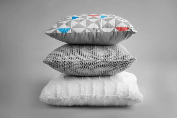 Soft pillows on light background — Stock Photo, Image