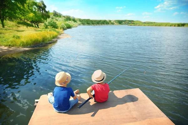 Cute children fishing on summer day — Stock Photo, Image