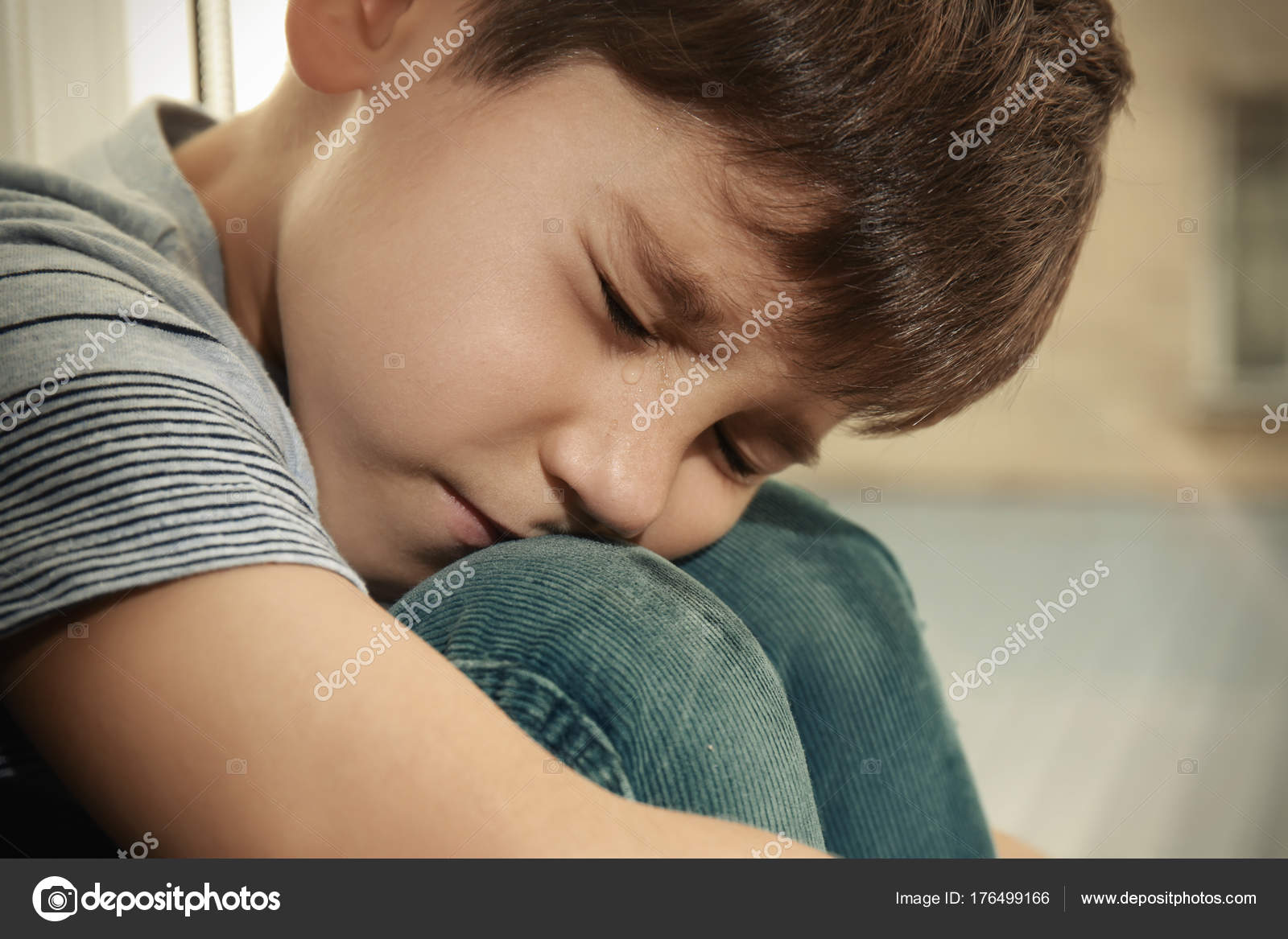 Little sad boy crying. Abuse of children concept Stock Photo by ...