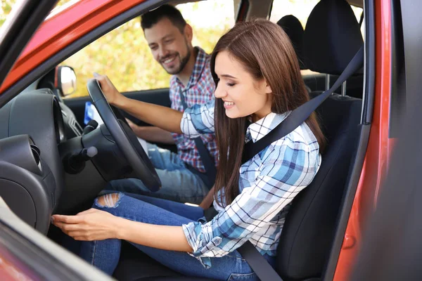 Young woman passing driving license exam — Stock Photo, Image