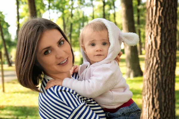 Mother with adorable little daughter together in park — Stock Photo, Image