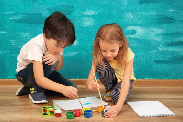 Cute little children painting at home — Stock Photo, Image