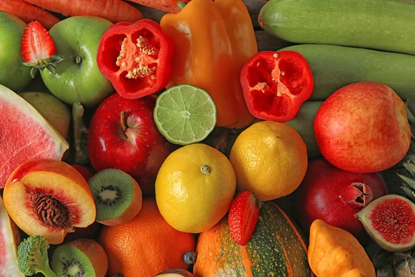 Muitas frutas e legumes diferentes como pano de fundo — Fotografia de Stock