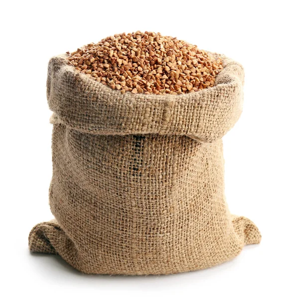 Beyaz arka plan üzerinde buğday ile çanta — Stok fotoğraf