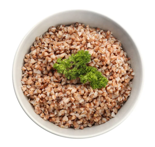 Ciotola con grano saraceno cotto su sfondo bianco — Foto Stock