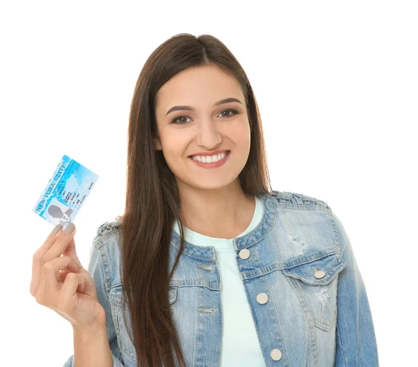 Jonge vrouw met rijbewijs op witte achtergrond — Stockfoto