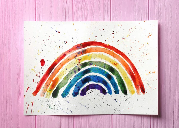 Aquarel van regenboog op houten achtergrond — Stockfoto
