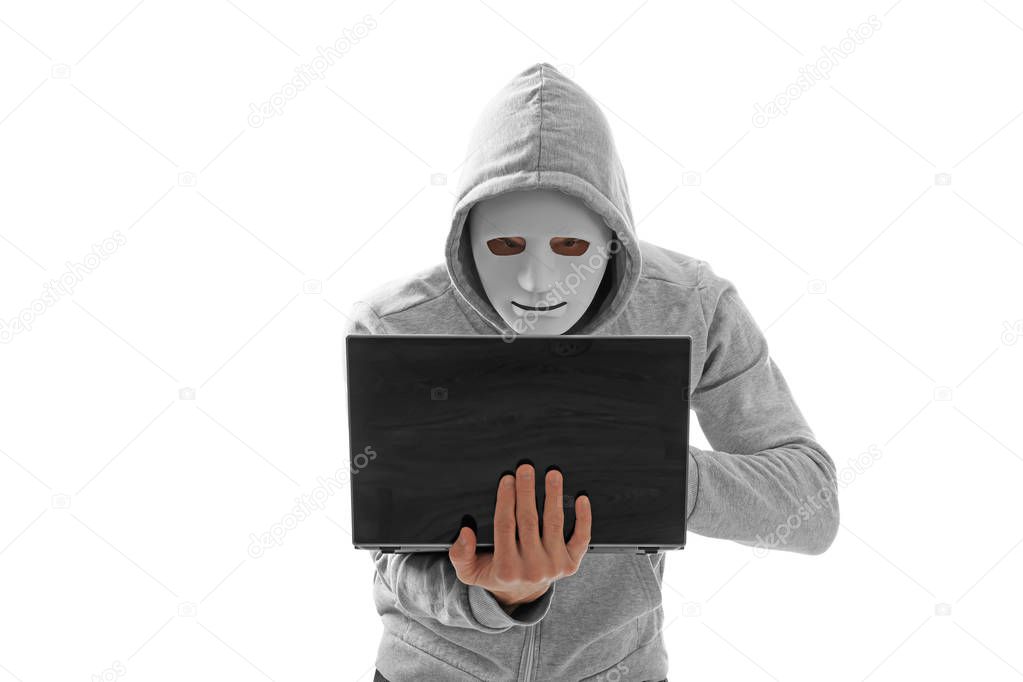 Professional hacker with laptop on white background