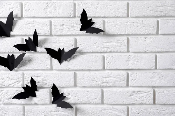 Paper bats as decor for Halloween party on wall — Stock Photo, Image