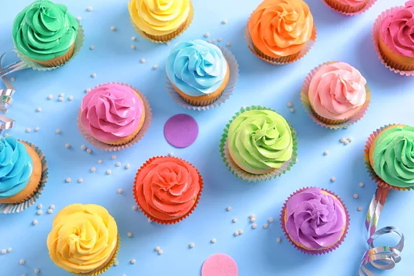 Delicious Cupcakes Color Background Top View — Stock Photo, Image