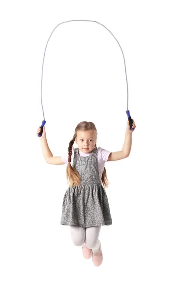 Cute little girl playing with jumping rope on white background — Stock Photo, Image