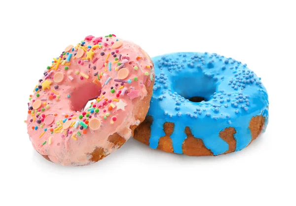 Bunte Donuts mit Streusel auf weißem Hintergrund — Stockfoto