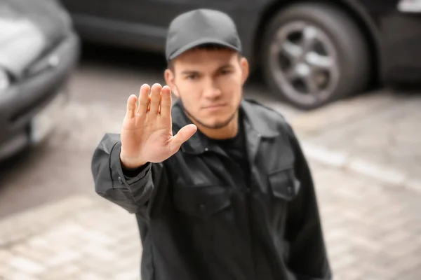 Male security guard on city street — Stock Photo, Image