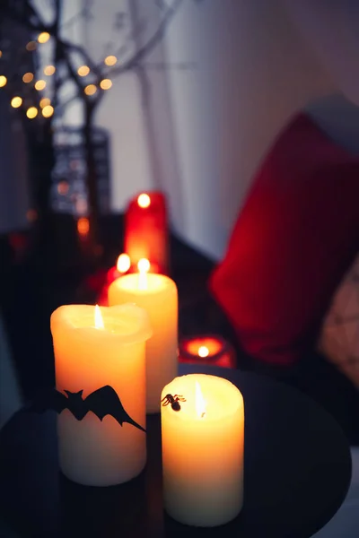 Creepy candles for Halloween on table indoors — Stock Photo, Image