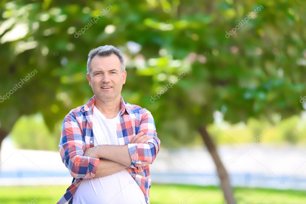 Mature man in casual clothes outdoors
