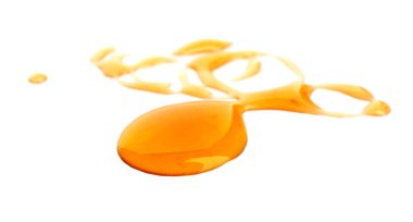 Beyaz arka plan üzerinde tatlı bal damla