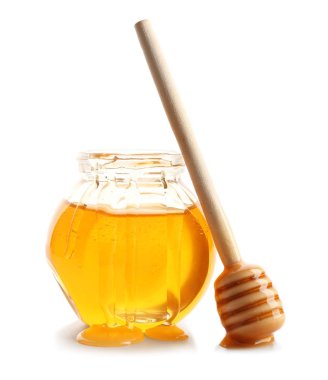 kavanoz bal ile üzerine beyaz izole Kepçe