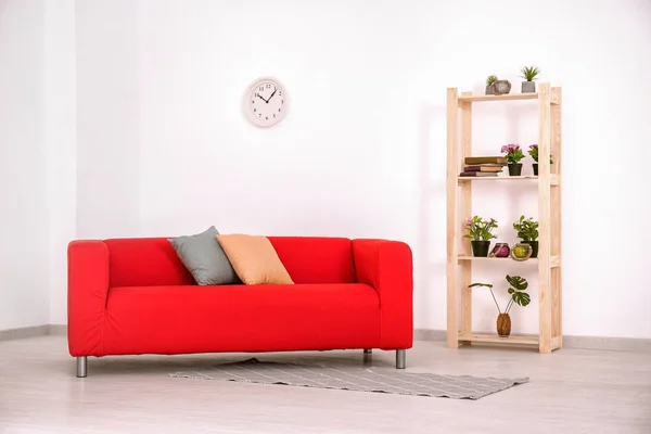 Living room interior with comfortable red sofa — Stock Photo, Image