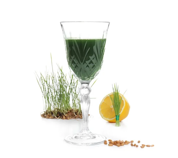 Glass of healthy juice and sprouted wheat grass — Stock Photo, Image