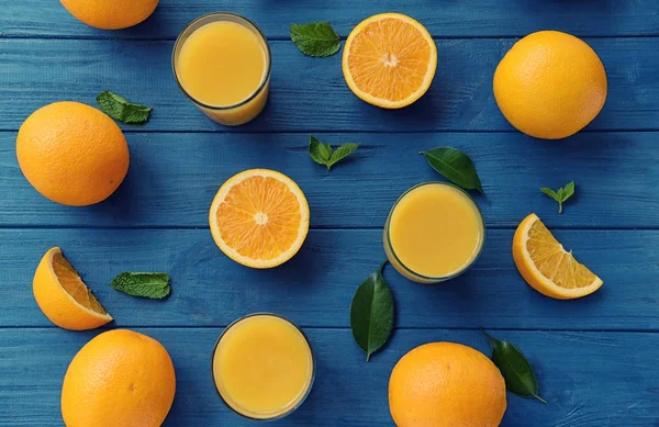 Taze portakal suyu gözlük ile kompozisyon 