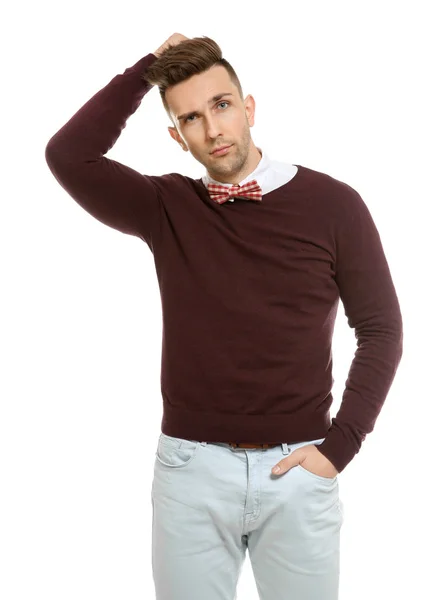 Handsome young man in bow tie on white background — Stock Photo, Image