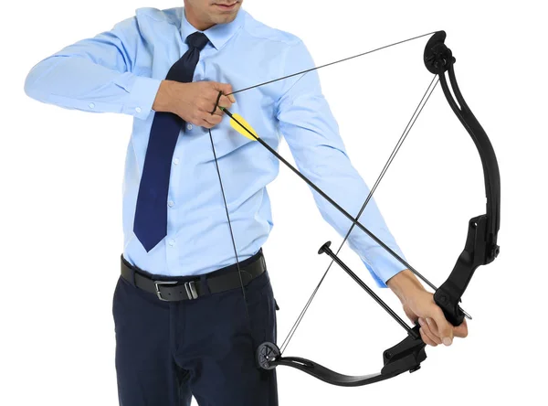 Young businessman practicing archery on white background — Stock Photo, Image