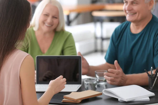 Senior couple meeting with consultant in office — Stock Photo, Image